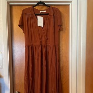 New with tags rust color Dawn Dress by Christy Dawn. Perfect condition
